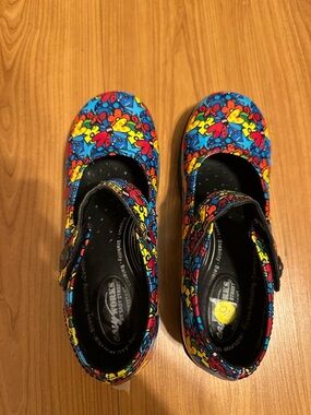 Brand new without tags.  Floral Mary Janes in Blue, Yellow & Red.